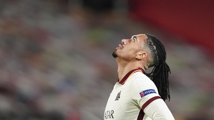 Romas Chris Smalling reacts at the end of the Europa League semi final, first leg soccer match between Manchester United and Roma at Old Trafford in Manchester, England, Thursday, April 29, 2021. (AP Photo/Jon Super)