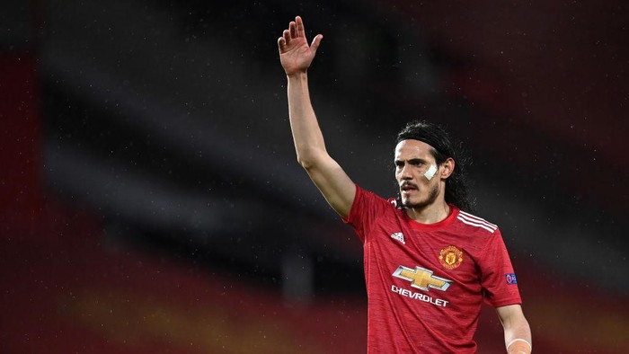 MANCHESTER, ENGLAND - APRIL 29: Edinson Cavani of Manchester United reacts during the UEFA Europa League Semi-final First Leg match between Manchester United and AS Roma at Old Trafford on April 29, 2021 in Manchester, England. Sporting stadiums around Europe remain under strict restrictions due to the Coronavirus Pandemic as Government social distancing laws prohibit fans inside venues resulting in games being played behind closed doors. (Photo by Michael Regan/Getty Images)