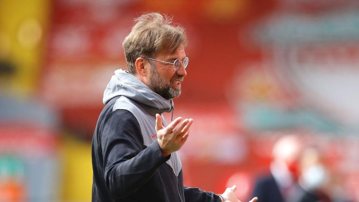 LIVERPOOL, ENGLAND - APRIL 24: Juergen Klopp, Manager of Liverpool is interviewed prior to the Premier League match between Liverpool and Newcastle United at Anfield on April 24, 2021 in Liverpool, England. Sporting stadiums around the UK remain under strict restrictions due to the Coronavirus Pandemic as Government social distancing laws prohibit fans inside venues resulting in games being played behind closed doors.  (Photo by David Klein - Pool/Getty Images)