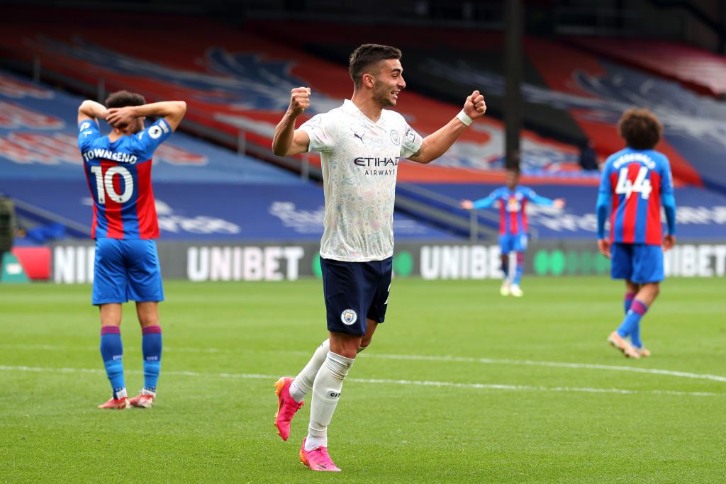 LONDON, ENGLAND - MAY 01: Sergio Aguero of Manchester City celebrates with teammates after scoring his team's first goal during the Premier League match between Crystal Palace and Manchester City at Selhurst Park on May 01, 2021 in London, England. Sporting stadiums around the UK remain under strict restrictions due to the Coronavirus Pandemic as Government social distancing laws prohibit fans inside venues resulting in games being played behind closed doors. (Photo by Clive Rose/Getty Images)