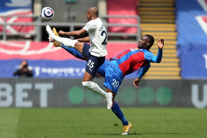 LONDON, ENGLAND - MAY 01: Fernandinho of Manchester City battles for possession with Christian Benteke of Crystal Palace during the Premier League match between Crystal Palace and Manchester City at Selhurst Park on May 01, 2021 in London, England. Sporting stadiums around the UK remain under strict restrictions due to the Coronavirus Pandemic as Government social distancing laws prohibit fans inside venues resulting in games being played behind closed doors. (Photo by Steven Paston - Pool/Getty Images)