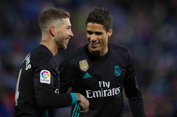 LEGANES, SPAIN - FEBRUARY 21: Sergio Ramos of Real Madrid celebrates with Rafael Varane after scoring his teamÕs third goal from the penalty spot during the La Liga match between Leganes and Real Madrid at Estadio Municipal de Butarque on February 21, 2018 in Leganes, Spain. (Photo by Denis Doyle/Getty Images )