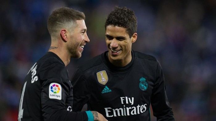 LEGANES, SPAIN - FEBRUARY 21: Sergio Ramos of Real Madrid celebrates with Rafael Varane after scoring his teamÕs third goal from the penalty spot during the La Liga match between Leganes and Real Madrid at Estadio Municipal de Butarque on February 21, 2018 in Leganes, Spain. (Photo by Denis Doyle/Getty Images )