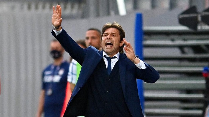 Inter Milans coach Antonio Conte gives directions to the players during the Italian Serie A soccer match between Crotone and Inter Milan at the Ezio Scida Stadium in Crotone, Italy, Saturday, May 1, 2021. (Francesco Mazzitello/LaPresse Via AP)