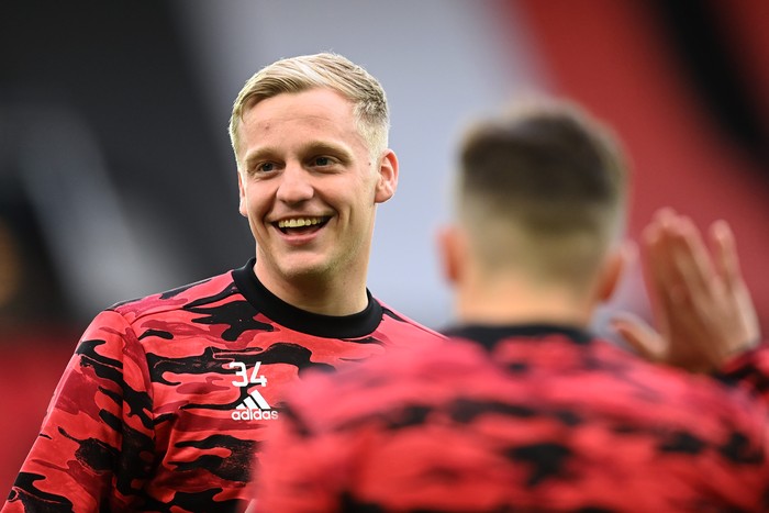 MANCHESTER, ENGLAND - APRIL 29: Donny van de Beek of Manchester United smiles prior to the UEFA Europa League Semi-final First Leg match between Manchester United and AS Roma at Old Trafford on April 29, 2021 in Manchester, England. Sporting stadiums around Europe remain under strict restrictions due to the Coronavirus Pandemic as Government social distancing laws prohibit fans inside venues resulting in games being played behind closed doors. (Photo by Michael Regan/Getty Images)