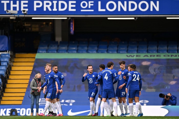 LONDON, ENGLAND - MAY 01: Kai Havertz of Chelsea celebrates with Andreas Christensen and Reece James after scoring their sides first goal during the Premier League match between Chelsea and Fulham at Stamford Bridge on May 01, 2021 in London, England. Sporting stadiums around the UK remain under strict restrictions due to the Coronavirus Pandemic as Government social distancing laws prohibit fans inside venues resulting in games being played behind closed doors. (Photo by Justin Setterfield/Getty Images)