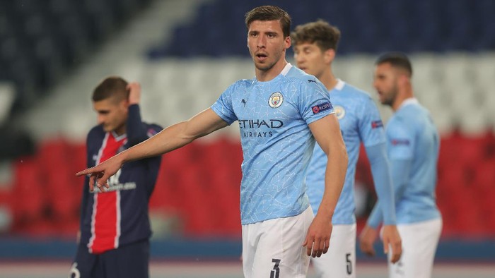 PARIS, FRANCE - APRIL 28: Ruben Dias of Manchester City reacts during the UEFA Champions League Semi Final First Leg match between Paris Saint-Germain and Manchester City at Parc des Princes on April 28, 2021 in Paris, France. Sporting stadiums around France remain under strict restrictions due to the Coronavirus Pandemic as Government social distancing laws prohibit fans inside venues resulting in games being played behind closed doors. (Photo by Alex Grimm/Getty Images)