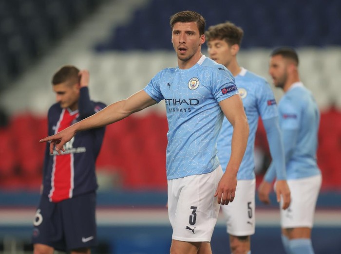 PARIS, FRANCE - APRIL 28: Ruben Dias of Manchester City reacts during the UEFA Champions League Semi Final First Leg match between Paris Saint-Germain and Manchester City at Parc des Princes on April 28, 2021 in Paris, France. Sporting stadiums around France remain under strict restrictions due to the Coronavirus Pandemic as Government social distancing laws prohibit fans inside venues resulting in games being played behind closed doors. (Photo by Alex Grimm/Getty Images)