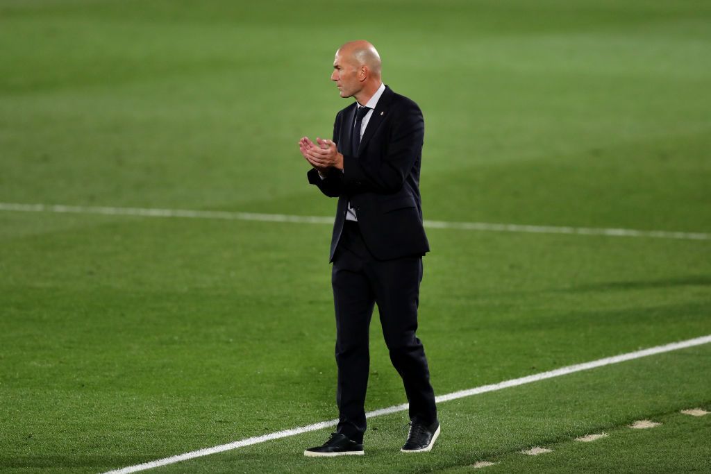 MADRID, SPAIN - SEPTEMBER 30: Zinedine Zidane, Head Coach of Real Madrid reacts during the La Liga Santander match between Real Madrid and Real Valladolid CF at Estadio Santiago Bernabeu on September 30, 2020 in Madrid, Spain. Football Stadiums around Europe remain empty due to the Coronavirus Pandemic as Government social distancing laws prohibit fans inside venues resulting in fixtures being played behind closed doors. (Photo by Gonzalo Arroyo Moreno/Getty Images)