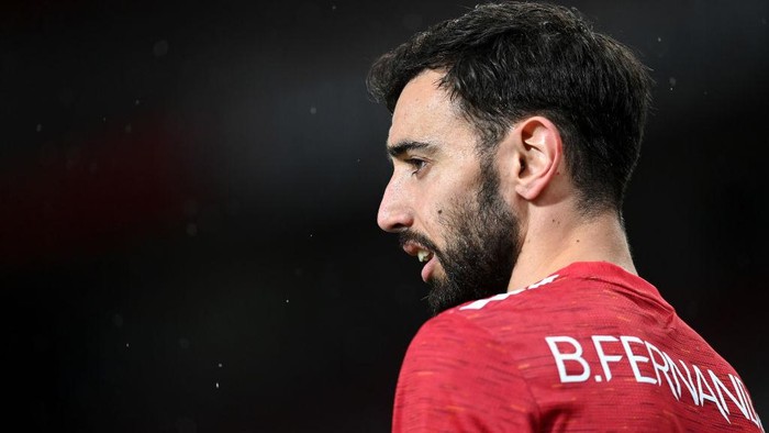 MANCHESTER, ENGLAND - APRIL 29: Bruno Fernandes of Manchester United looks on during the UEFA Europa League Semi-final First Leg match between Manchester United and AS Roma at Old Trafford on April 29, 2021 in Manchester, England. Sporting stadiums around Europe remain under strict restrictions due to the Coronavirus Pandemic as Government social distancing laws prohibit fans inside venues resulting in games being played behind closed doors. (Photo by Michael Regan/Getty Images)