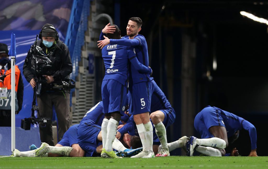 LONDON, ENGLAND - MAY 05: Jorginho and Ngolo Kante of Chelsea celebrate after Mason Mount (obstructed) scored their team's second goal during the UEFA Champions League Semi Final Second Leg match between Chelsea and Real Madrid at Stamford Bridge on May 05, 2021 in London, England. Sporting stadiums around Europe remain under strict restrictions due to the Coronavirus Pandemic as Government social distancing laws prohibit fans inside venues resulting in games being played behind closed doors. (Photo by Clive Rose/Getty Images)