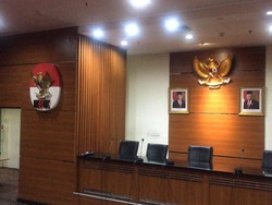 Tak Ada Lagi Logo KPK di Antara Foto Jokowi-Maruf di Ruang Jumpa Pers