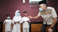 Momen Berbagi Bersama  Anak Yatim dan Dhuafa