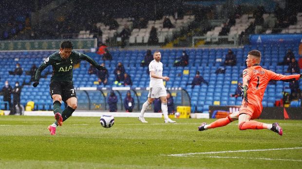 Soccer Football - Premier League - Leeds United v Tottenham Hotspur - Elland Road, Leeds, Britain - May 8, 2021 Tottenham Hotspur's Son Heung-min scores their first goal Pool via REUTERS/Jason Cairnduff EDITORIAL USE ONLY. No use with unauthorized audio, video, data, fixture lists, club/league logos or 'live' services. Online in-match use limited to 75 images, no video emulation. No use in betting, games or single club /league/player publications.  Please contact your account representative for further details.