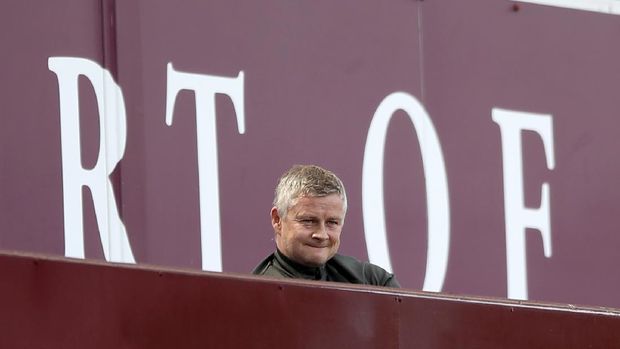 Manchester United's manager Ole Gunnar Solskjaer looks out from the stands during the English Premier League soccer match between Aston Villa and Manchester United at Villa Park in Birmingham, England, Sunday, May 9, 2021. (Nick Potts/Pool via AP)