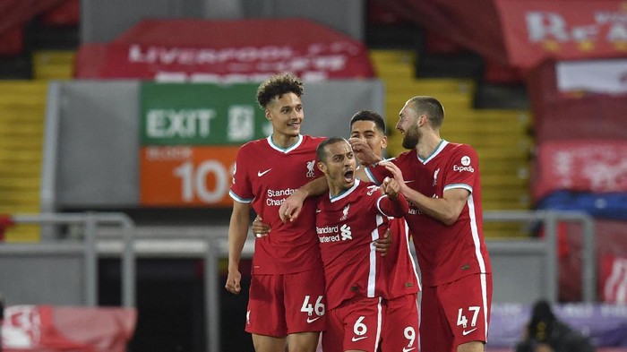 Liverpools Thiago, center, celebrates with teammates after scoring his sides second goal during the English Premier League soccer match between Liverpool and Southampton at Anfield stadium in Liverpool, England, Saturday, May 8, 2021. (Paul Ellis/Pool via AP)