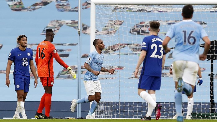 MANCHESTER, ENGLAND - MAY 08: Raheem Sterling of Manchester City celebrates after scoring their sides first goal during the Premier League match between Manchester City and Chelsea at Etihad Stadium on May 08, 2021 in Manchester, England. Sporting stadiums around the UK remain under strict restrictions due to the Coronavirus Pandemic as Government social distancing laws prohibit fans inside venues resulting in games being played behind closed doors. (Photo by Martin Rickett - Pool/Getty Images)
