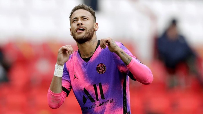 PSGs Neymar celebrates after scoring his sides first goal during the French League One soccer match between Paris Saint-Germain and Lens at the Parc des Princes stadium in Paris, France, Saturday, May 1, 2021. (AP Photo/Thibault Camus)