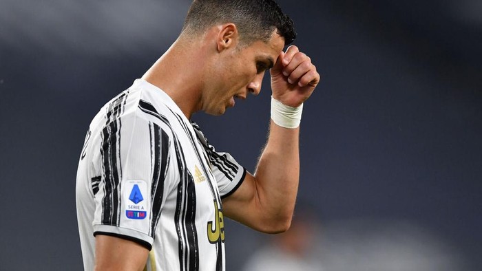 TURIN, ITALY - MAY 09: Cristiano Ronaldo of Juventus looks dejected during the Serie A match between Juventus  and AC Milan at  on May 09, 2021 in Turin, Italy. Sporting stadiums around Italy remain under strict restrictions due to the Coronavirus Pandemic as Government social distancing laws prohibit fans inside venues resulting in games being played behind closed doors. (Photo by Valerio Pennicino/Getty Images)