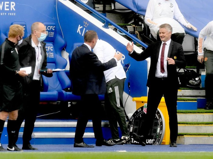 LEICESTER, ENGLAND - JULY 26: Brendan Rodgers, Manager of Leicester City greets Ole Gunnar Solskjaer, Manager of Manchester United prior to the Premier League match between Leicester City and Manchester United at The King Power Stadium on July 26, 2020 in Leicester, England.Football Stadiums around Europe remain empty due to the Coronavirus Pandemic as Government social distancing laws prohibit fans inside venues resulting in all fixtures being played behind closed doors. (Photo by Michael Regan/Getty Images)