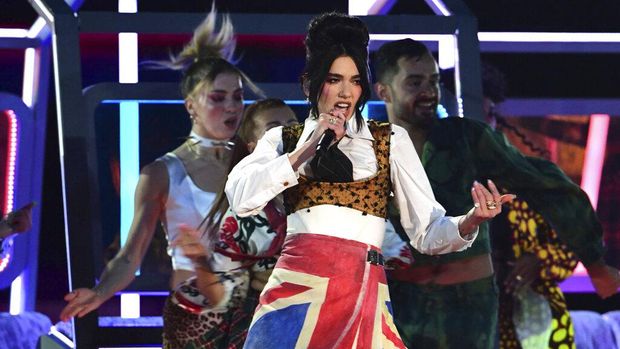 Dua Lipa performs during the Brit Awards 2021 at the O2 Arena, London, Tuesday, May 11, 2021. (Ian West/PA via AP)