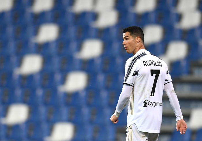 REGGIO NELLEMILIA, ITALY - MAY 12: Cristiano Ronaldo of Juventus looks on during the Serie A match between US Sassuolo and Juventus at Mapei Stadium - Città del Tricolore on May 12, 2021 in Reggio nellEmilia, Italy. Sporting stadiums around Italy remain under strict restrictions due to the Coronavirus Pandemic as Government social distancing laws prohibit fans inside venues resulting in games being played behind closed doors.  (Photo by Alessandro Sabattini/Getty Images)
