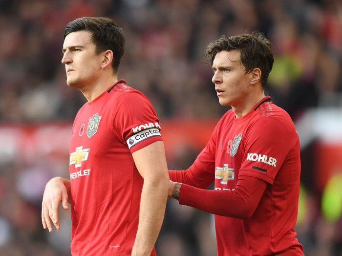 MANCHESTER, ENGLAND - NOVEMBER 10: Harry Maguire and Victor Lindelof of Manchester United look on during the Premier League match between Manchester United and Brighton & Hove Albion at Old Trafford on November 10, 2019 in Manchester, United Kingdom. (Photo by Michael Regan/Getty Images)