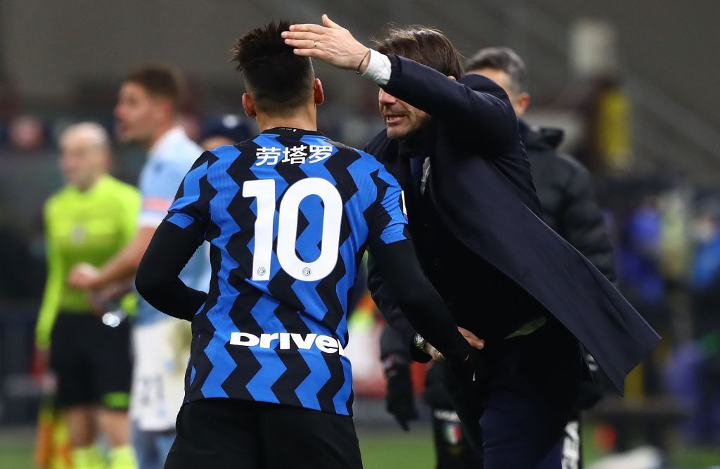 MILAN, ITALY - FEBRUARY 14:  Lautaro Martinez of FC Internazionale celebrates with his coach Antonio Conte after scoring their side's third goal during the Serie A match between FC Internazionale  and SS Lazio at Stadio Giuseppe Meazza on February 14, 2021 in Milan, Italy. (Photo by Marco Luzzani/Getty Images)