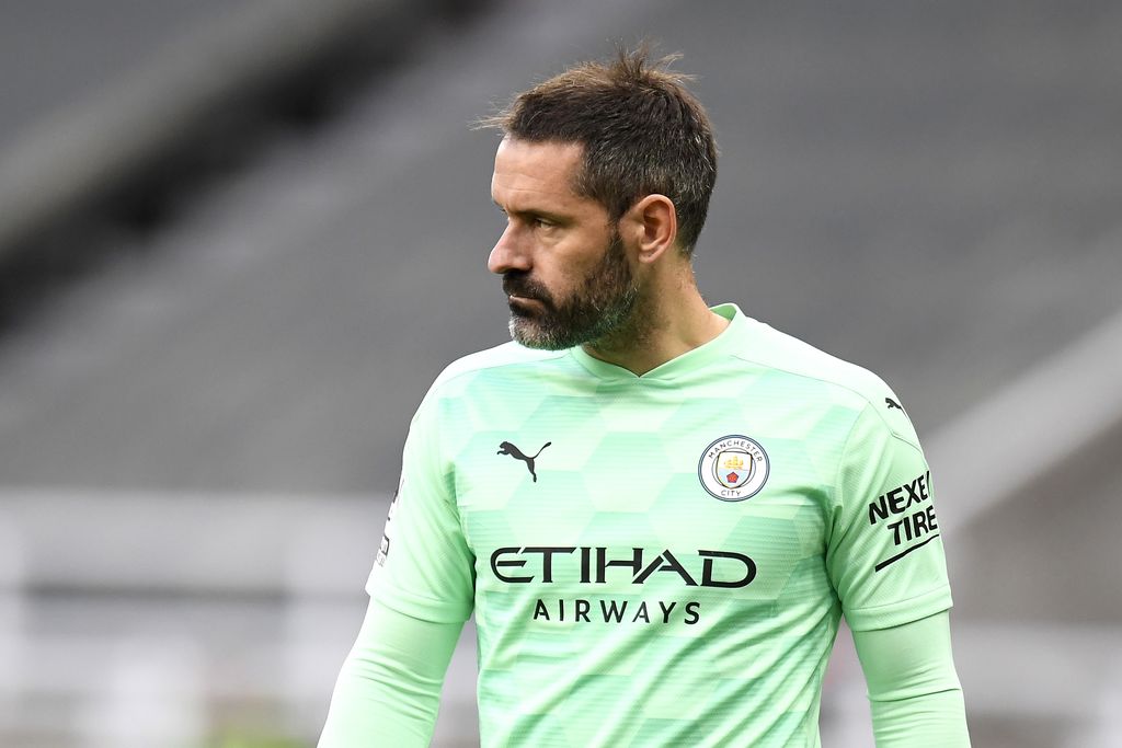 NEWCASTLE UPON TYNE, ENGLAND - MAY 14: Scott Carson of Manchester City looks on during the Premier League match between Newcastle United and Manchester City at St. James Park on May 14, 2021 in Newcastle upon Tyne, England. Sporting stadiums around the UK remain under strict restrictions due to the Coronavirus Pandemic as Government social distancing laws prohibit fans inside venues resulting in games being played behind closed doors.  (Photo by Peter Powell - Pool/Getty Images)