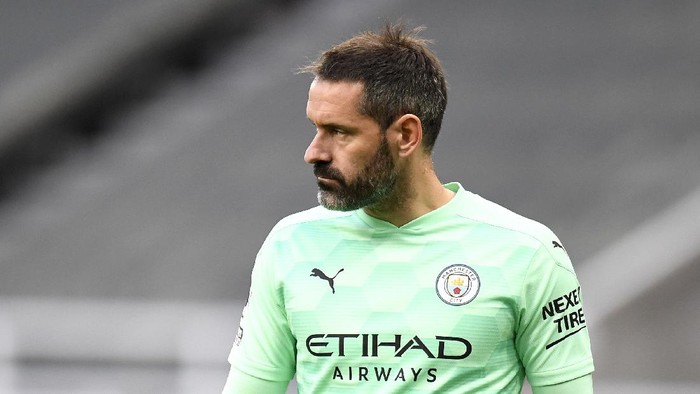 NEWCASTLE UPON TYNE, ENGLAND - MAY 14: Scott Carson of Manchester City looks on during the Premier League match between Newcastle United and Manchester City at St. James Park on May 14, 2021 in Newcastle upon Tyne, England. Sporting stadiums around the UK remain under strict restrictions due to the Coronavirus Pandemic as Government social distancing laws prohibit fans inside venues resulting in games being played behind closed doors.  (Photo by Peter Powell - Pool/Getty Images)