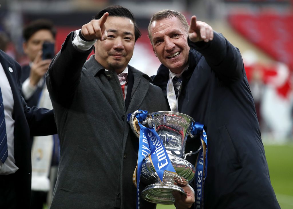 LONDON, ENGLAND - MAY 15: Khun Top, Chairman of Leicester City celebrates with Brendan Rodgers (R), Manager of Leicester City following The Emirates FA Cup Final match between Chelsea and Leicester City at Wembley Stadium on May 15, 2021 in London, England. A limited number of around 21,000 fans, subject to a negative lateral flow test, will be allowed inside Wembley Stadium to watch this year's FA Cup Final as part of a pilot event to trial the return of large crowds to UK venues. (Photo by Matt Childs - Pool/Getty Images)