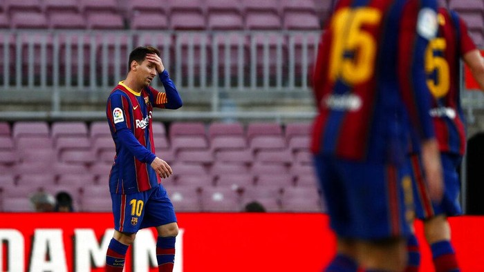 Barcelonas Lionel Messi reacts during the Spanish La Liga soccer match between FC Barcelona and Celta at the Camp Nou stadium in Barcelona, Spain, Sunday, May. 16, 2021. (AP Photo/Joan Monfort)