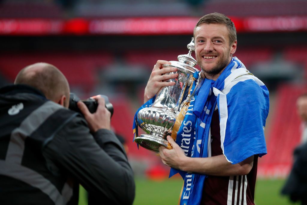 LONDON, ENGLAND - MAY 15: Jamie Vardy of Leicester City celebrates with the Emirates FA Cup trophy following The Emirates FA Cup Final match between Chelsea and Leicester City at Wembley Stadium on May 15, 2021 in London, England. A limited number of around 21,000 fans, subject to a negative lateral flow test, will be allowed inside Wembley Stadium to watch this year's FA Cup Final as part of a pilot event to trial the return of large crowds to UK venues. (Photo by Matt Childs - Pool/Getty Images)