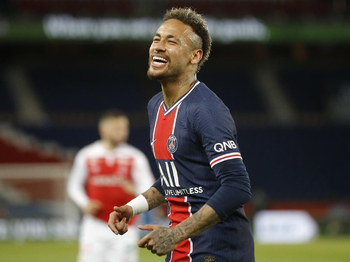 PSG's Neymar smiles during the French League One soccer match between Paris Saint-Germain and Reims at the Parc des Princes stadium in Paris, France, Sunday, May 16, 2021. (AP Photo/Michel Euler)