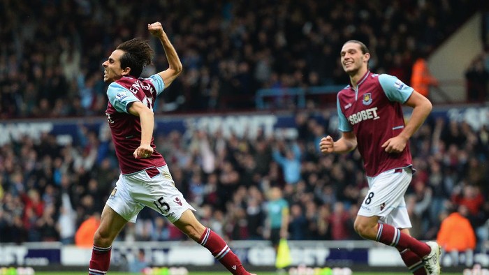 LONDON, ENGLAND - OCTOBER 20: Yossi Benayoun of West Ham celebrates with team mate Andy Carroll after crossing for Kevin Noble to score after scoring from the spot during the Barclays Premier League match between West Ham United and Southampton at Boleyn Ground on October 20, 2012 in London, England. (Photo by Mike Hewitt/Getty Images)