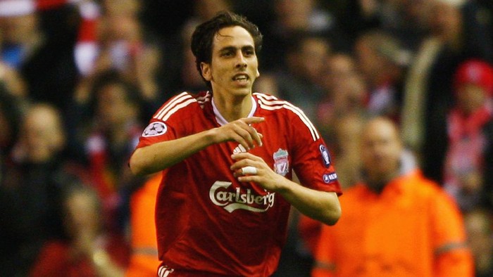 LIVERPOOL, ENGLAND - OCTOBER 20:  Yossi Benayoun of Liverpool runs towards his bench to celebrate after he scored the first goal during the UEFA Champions League Group E match between Liverpool and Lyon at Anfield on October 20, 2009 in Liverpool, England.  (Photo by Clive Brunskill/Getty Images)