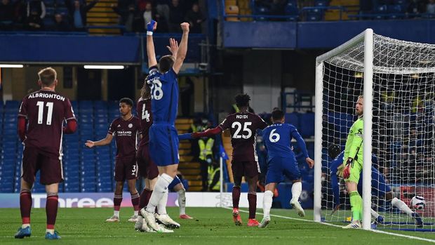 Chelsea vs Leicester City Soccer Football - Premier League - Chelsea v Leicester City - Stamford Bridge, London, Britain - May 18, 2021 Leicester City's Kasper Schmeichel reacts after Chelsea's Antonio Rudiger scored their first goal Pool via REUTERS/Glyn Kirk EDITORIAL USE ONLY. No use with unauthorized audio, video, data, fixture lists, club/league logos or 'live' services. Online in-match use limited to 75 images, no video emulation. No use in betting, games or single club /league/player publications. Please contact your account representative for further details.