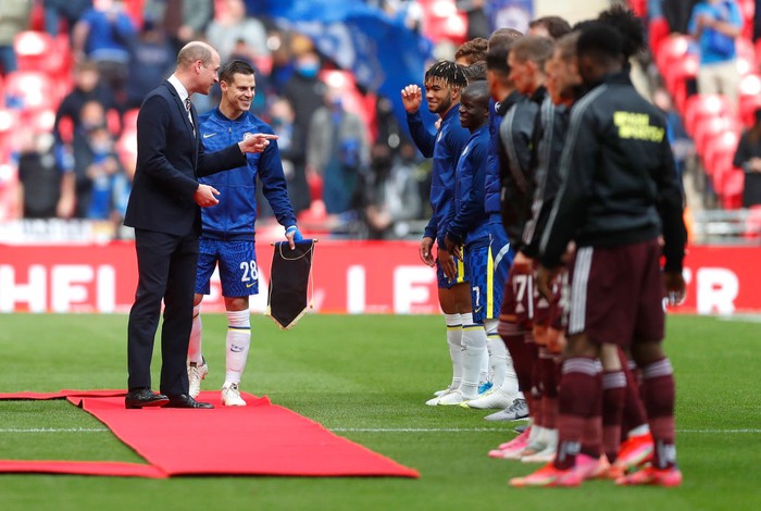 LONDON, ENGLAND - MAY 15: Prince William, Duke of Cambridge meets the Chelsea team introduced by Cesar Azpilicueta of Chelsea on the pitch prior to The Emirates FA Cup Final match between Chelsea and Leicester City at Wembley Stadium on May 15, 2021 in London, England. A limited number of around 21,000 fans, subject to a negative lateral flow test, will be allowed inside Wembley Stadium to watch this years FA Cup Final as part of a pilot event to trial the return of large crowds to UK venues. (Photo by Matt Childs - Pool/Getty Images)