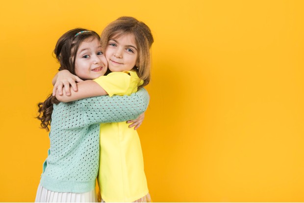 Two Girls Hugging | Freepik.com Two Girls Hugging | Freepik.com