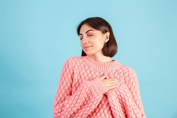Young Girl in Pink Sweater | Freepik.com
