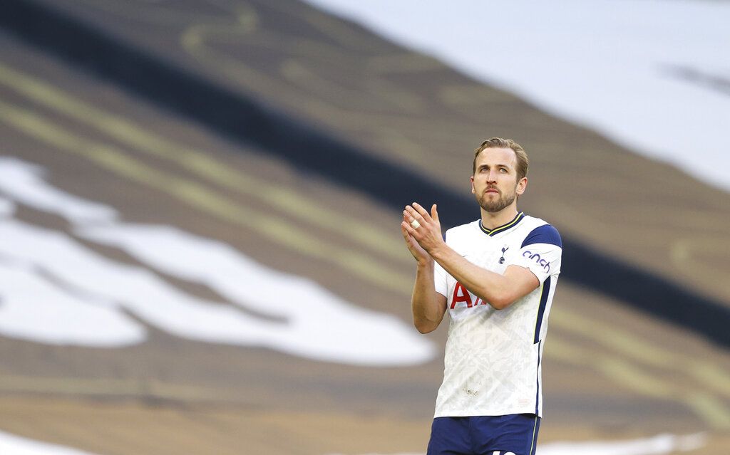 Tottenham's Harry Kane applauds to supporters at the end of the English Premier League soccer match between Tottenham Hotspur and Aston Villa at the Tottenham Hotspur Stadium in London, Wednesday, May 19, 2021. (Richard Heathcote/Pool via AP)