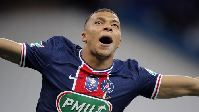 PSGs Kylian Mbappe celebrates after scoring his sides second goal during the French Cup final soccer match between Paris Saint Germain and Monaco at the Stade de France stadium, in Saint Denis, north of Paris, Wednesday, May 19, 2021. (AP Photo/Christophe Ena)