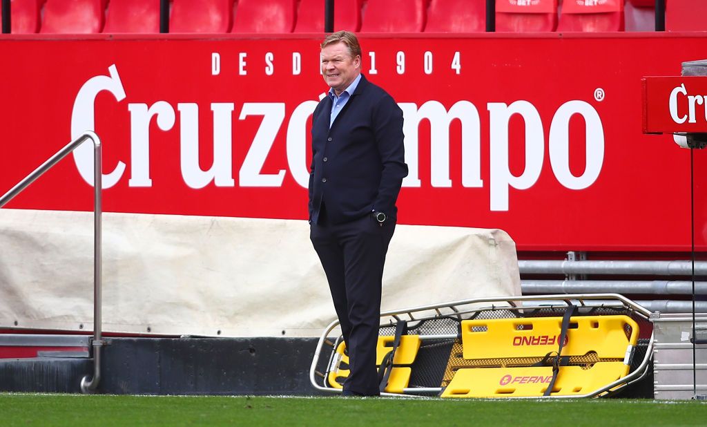 SEVILLE, SPAIN - FEBRUARY 27: Ronald Koeman, Head Coach of FC Barcelona looks on during the La Liga Santander match between Sevilla FC and FC Barcelona at Estadio Ramon Sanchez Pizjuan on February 27, 2021 in Seville, Spain. Sporting stadiums around Spain remain under strict restrictions due to the Coronavirus Pandemic as Government social distancing laws prohibit fans inside venues resulting in games being played behind closed doors. (Photo by Fran Santiago/Getty Images)