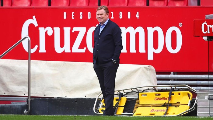 SEVILLE, SPAIN - FEBRUARY 27: Ronald Koeman, Head Coach of FC Barcelona looks on during the La Liga Santander match between Sevilla FC and FC Barcelona at Estadio Ramon Sanchez Pizjuan on February 27, 2021 in Seville, Spain. Sporting stadiums around Spain remain under strict restrictions due to the Coronavirus Pandemic as Government social distancing laws prohibit fans inside venues resulting in games being played behind closed doors. (Photo by Fran Santiago/Getty Images)