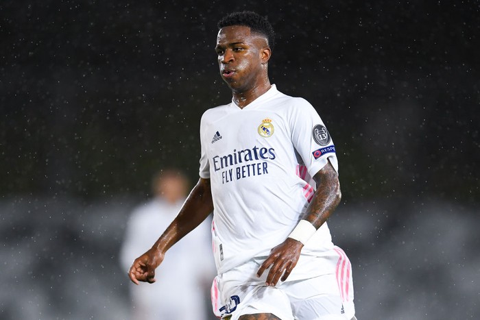 Vinicius Jr MADRID, SPAIN - APRIL 27: Vinicius Jr of Real Madrid CF looks on during the UEFA Champions League Semi Final First Leg match between Real Madrid and Chelsea FC at Estadio Alfredo Di Stefano on April 27, 2021 in Madrid, Spain. Sporting stadiums around Spain remain under strict restrictions due to the Coronavirus Pandemic as Government social distancing laws prohibit fans inside venues resulting in games being played behind closed doors (Photo by David Ramos/Getty Images)