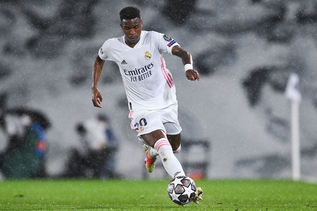 MADRID, SPAIN - APRIL 27: Vinicius Jr of Real Madrid CF looks on during the UEFA Champions League Semi Final First Leg match between Real Madrid and Chelsea FC at Estadio Alfredo Di Stefano on April 27, 2021 in Madrid, Spain. Sporting stadiums around Spain remain under strict restrictions due to the Coronavirus Pandemic as Government social distancing laws prohibit fans inside venues resulting in games being played behind closed doors (Photo by David Ramos/Getty Images)