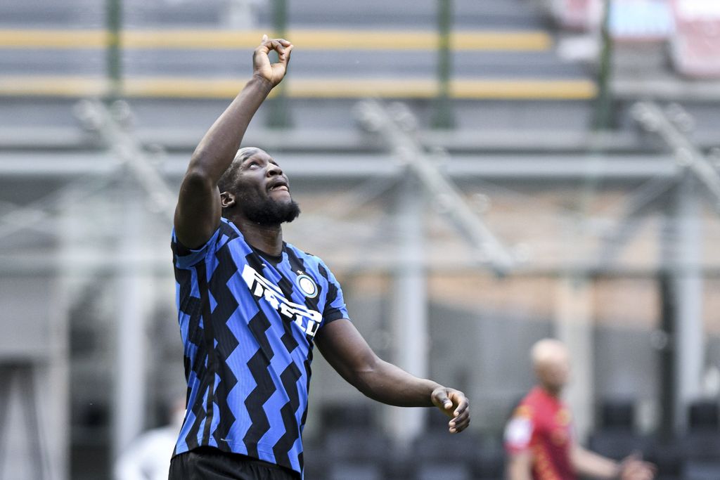 Inter Milan's Romelo Lukaku celebrates after scoring during the Serie A soccer match between Inter and Udinese, at the San Siro stadium in Milan, Italy, Sunday, May 23, 2021. Inter won its first Serie A title in 11 years this month. (Piero Cruciatti/LaPresse via AP)