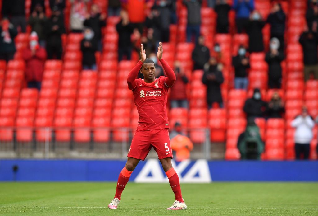 LIVERPOOL, ENGLAND - MAY 23: Georginio Wijnaldum of Liverpool applauds the fans as he is substituted during the Premier League match between Liverpool and Crystal Palace at Anfield on May 23, 2021 in Liverpool, England. A limited number of fans will be allowed into Premier League stadiums as Coronavirus restrictions begin to ease in the UK. (Photo by Paul Ellis - Pool/Getty Images)