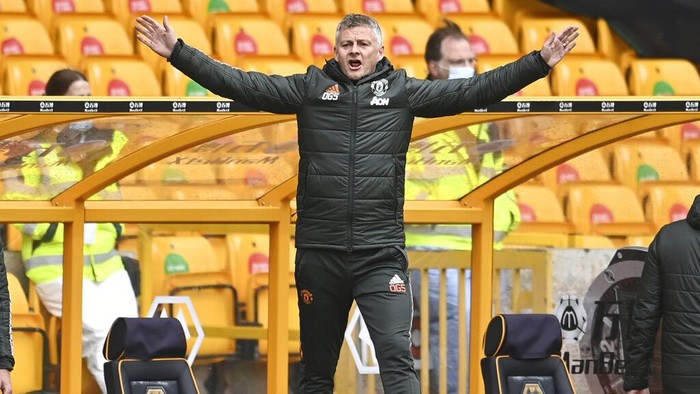 Manchester Uniteds manager Ole Gunnar Solskjaer reacts during the English Premier League soccer match between Wolverhampton Wanderers and Manchester United at the Molineux Stadium in Wolverhampton, England, Sunday, May 23, 2021. (Andy Rain/Pool via AP)