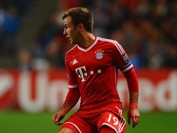 Mario Goetze juga bisa langsung membawa gelar juara Bundesliga untuk Bayern Munich, usai pindah dari Borussia Dortmund pada 2013/2014. Di musim pertamanya, Goetze juga mencetak 15 gol dari 45 penampilan. (Foto: Laurence Griffiths/Getty Images)